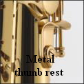 Metal thumb rest